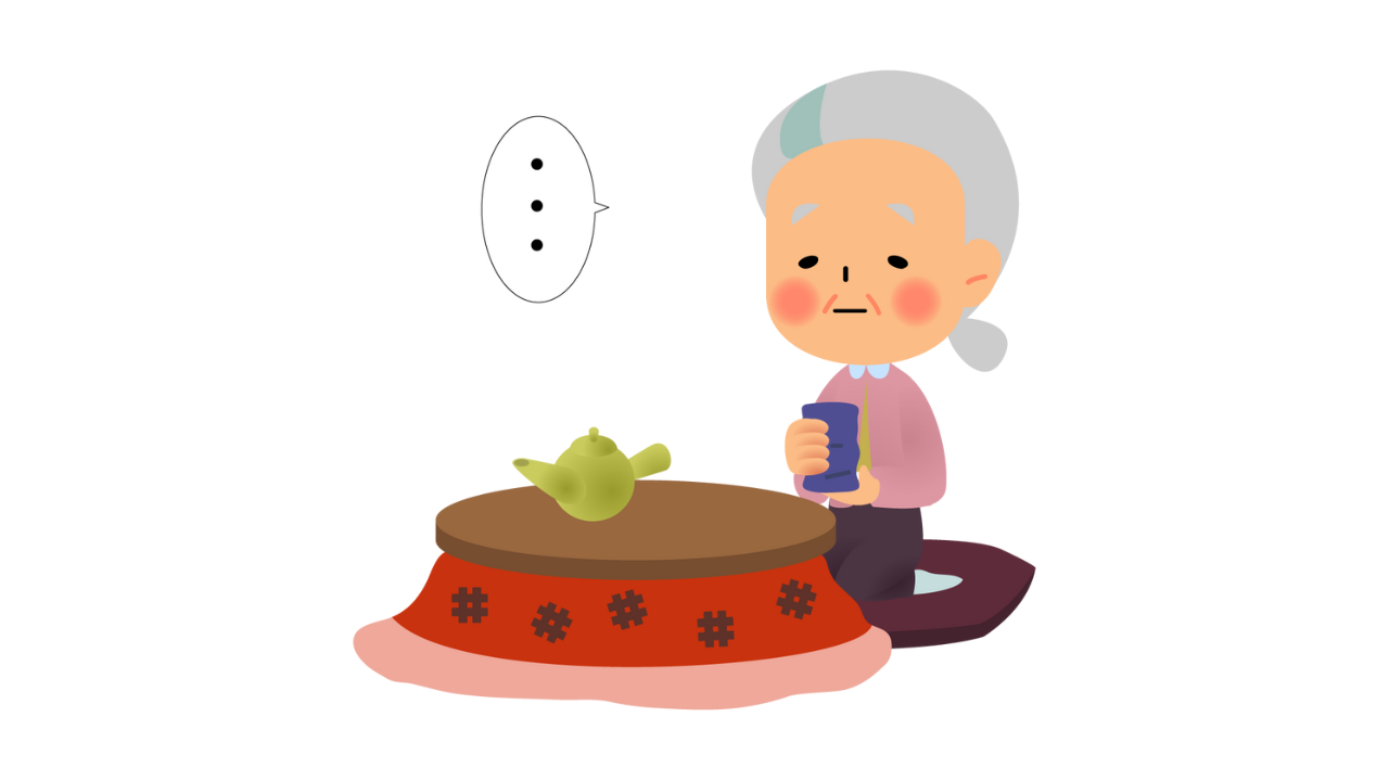 Grandma drinking tea in a kotatsu